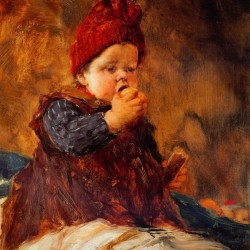 Baby eating fruit